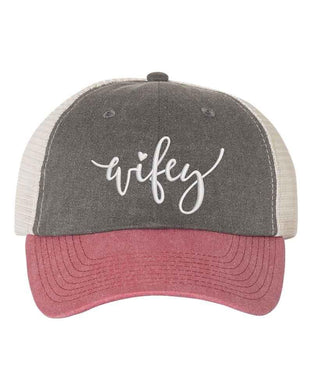 Trucker hat with 'wifey' text on a white background