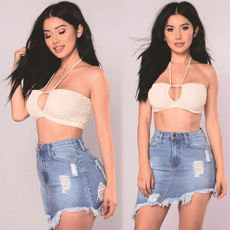 Two images of a woman wearing a beige top and denim skirt on a plain background