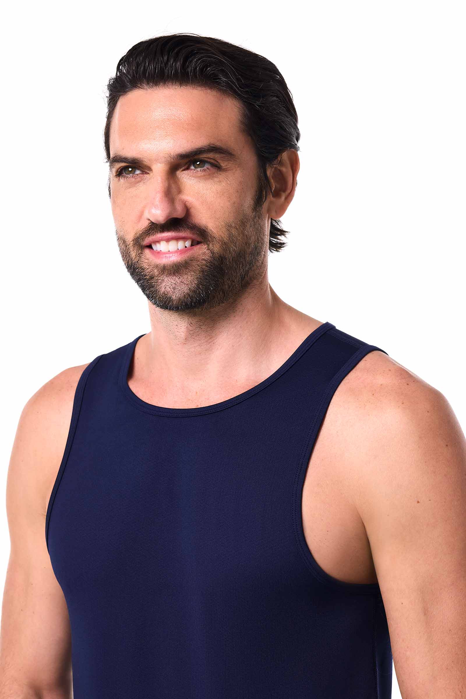 Man wearing a navy blue tank top on a white background