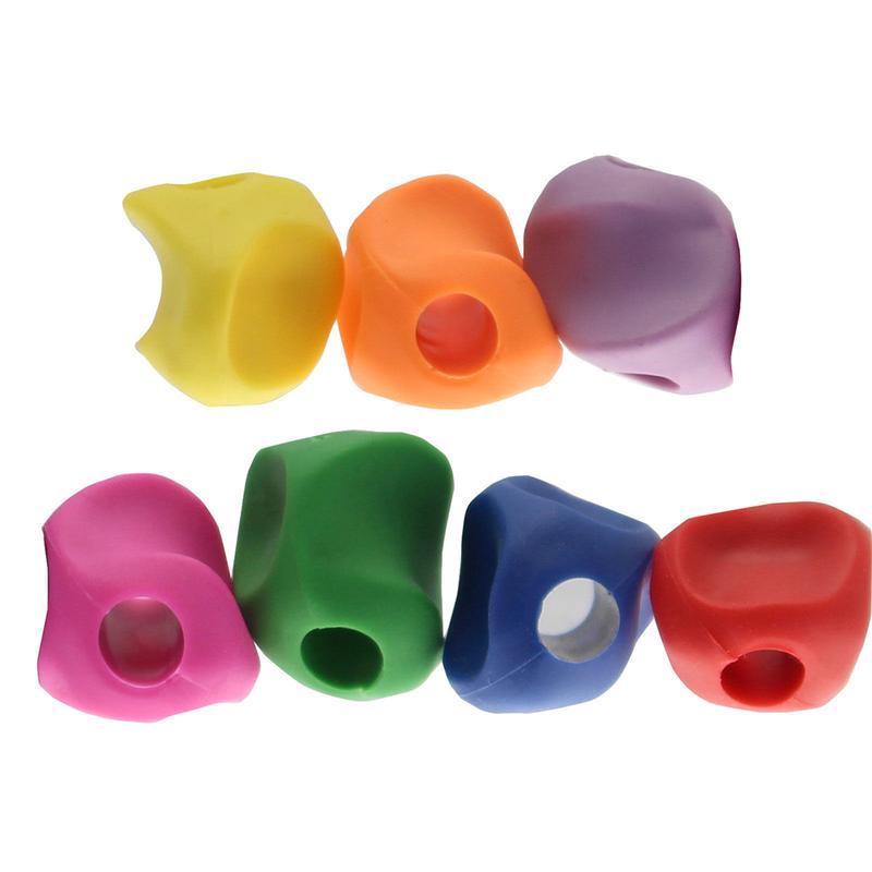 Set of colorful silicone earbud tips on a white background