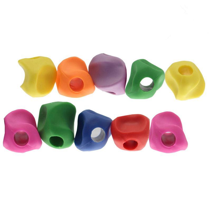 Colorful pencil sharpeners arranged in a row on a white background