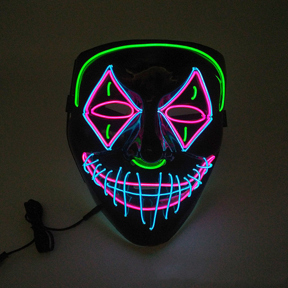 Neon LED mask with pink and green lights on a dark background