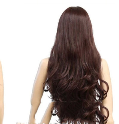 Long brown wig on a mannequin head with a white background