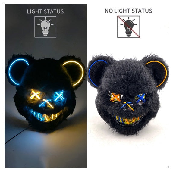 Two black plush toys with LED lights, one illuminated and one not, on a white background.