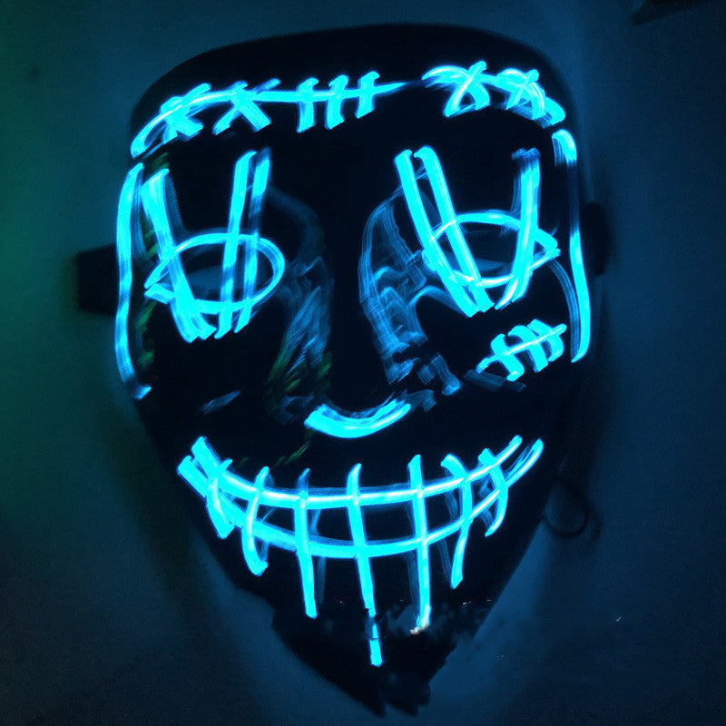 Neon blue LED mask on a dark background