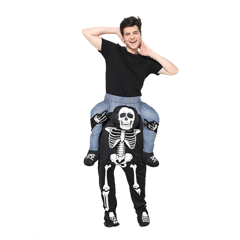Person wearing a skeleton costume riding on another person's shoulders against a white background