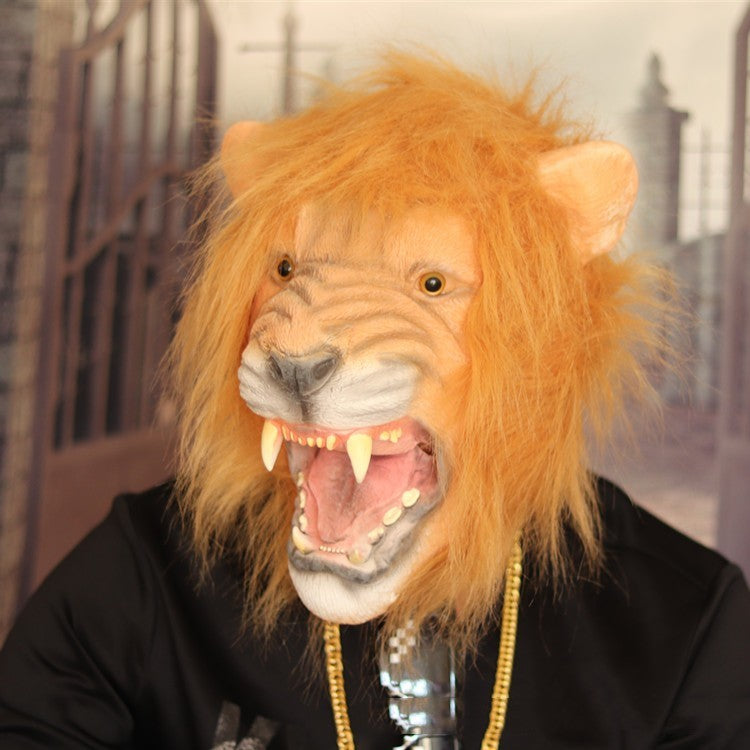 Person wearing a lion mask with a blurred background