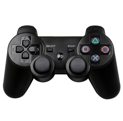 Black gaming controller on a white background