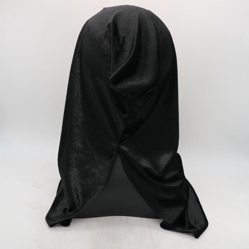 Black fabric draped over a neutral background