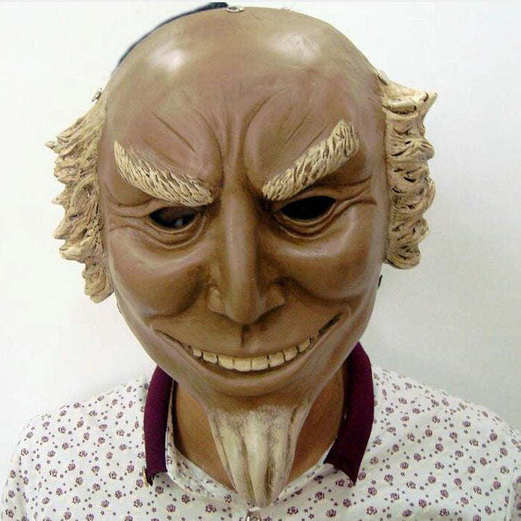 Mask with detailed facial features and hair on a white background
