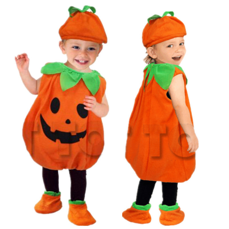 Two children wearing pumpkin costumes on a white background