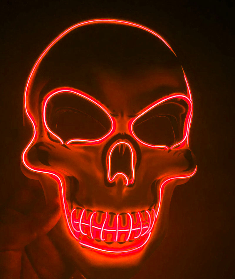 Red LED skull mask on a dark background