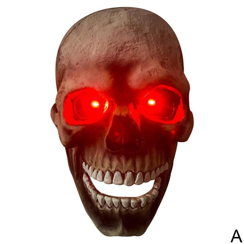 Skull mask with glowing red eyes on a white background