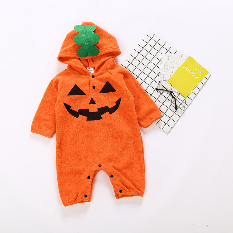 Orange baby romper with pumpkin face design on a white background