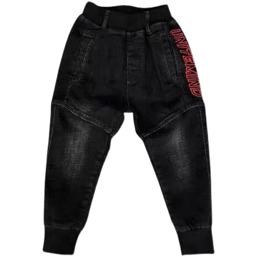 Black jeans with red text on a white background