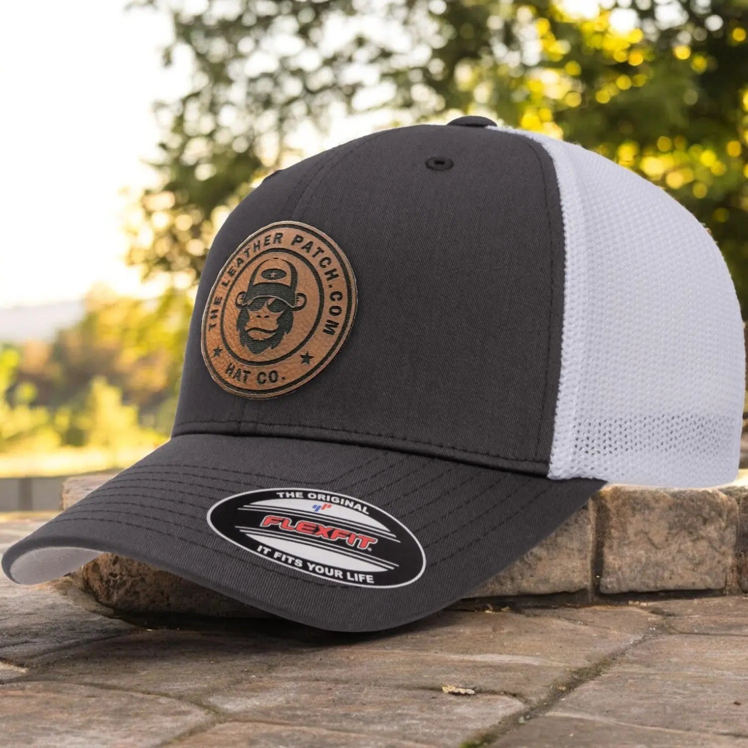 The Flexfit® 6511 Trucker Cap + Custom Patch