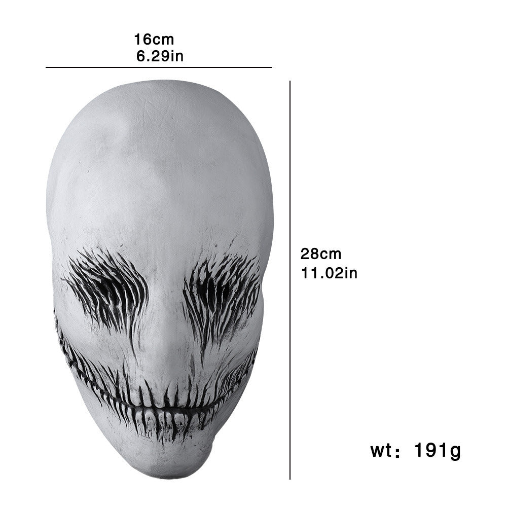 White alien mask with black eye and mouth details, shown with measurements and weight on a white background.