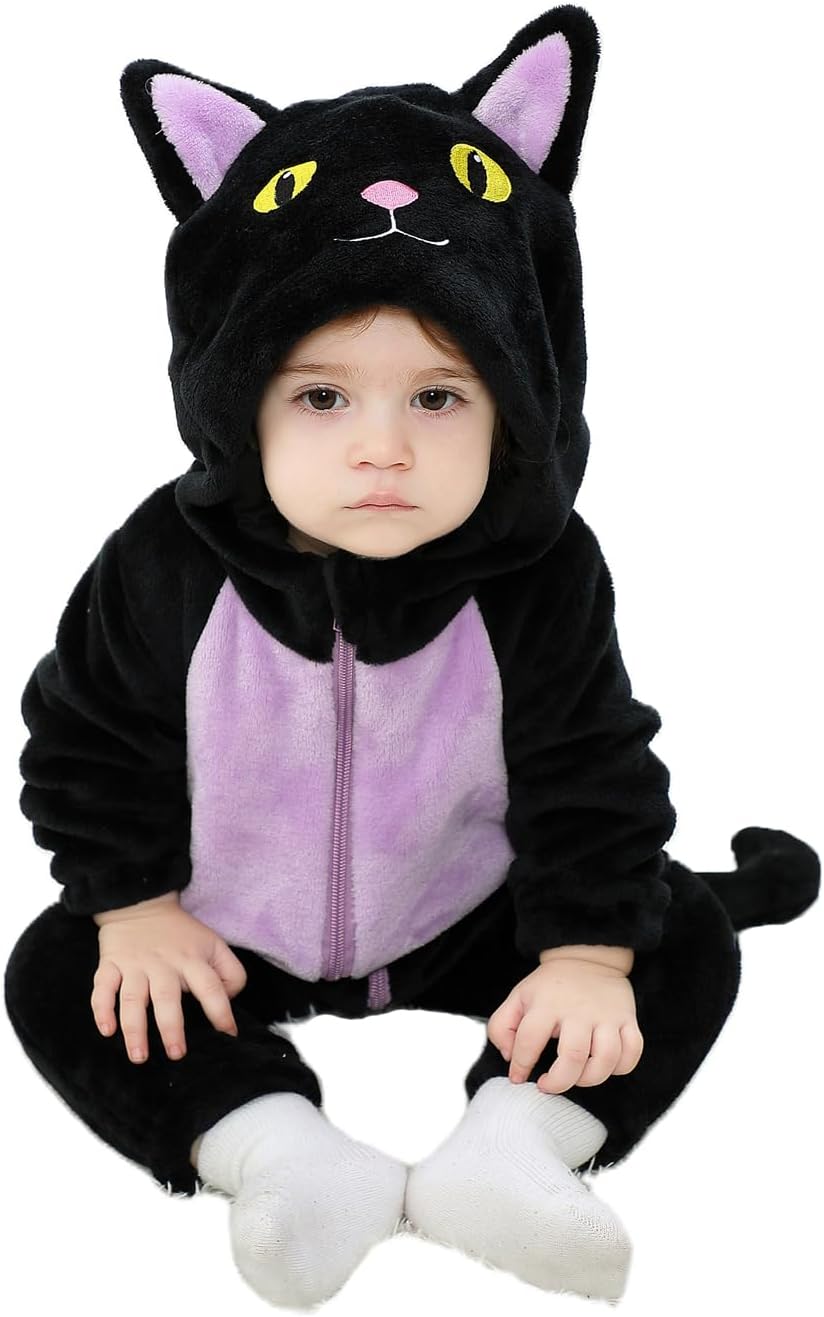 Child wearing a black cat costume with purple accents on a white background
