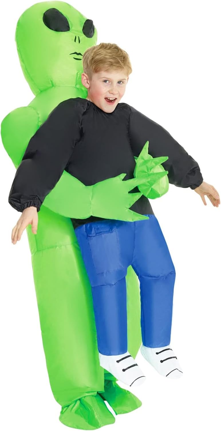 Child wearing an inflatable alien costume on a white background
