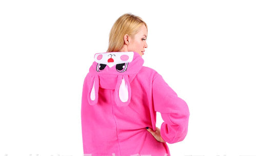 Person wearing a pink animal-themed onesie with cartoon face design on a white background