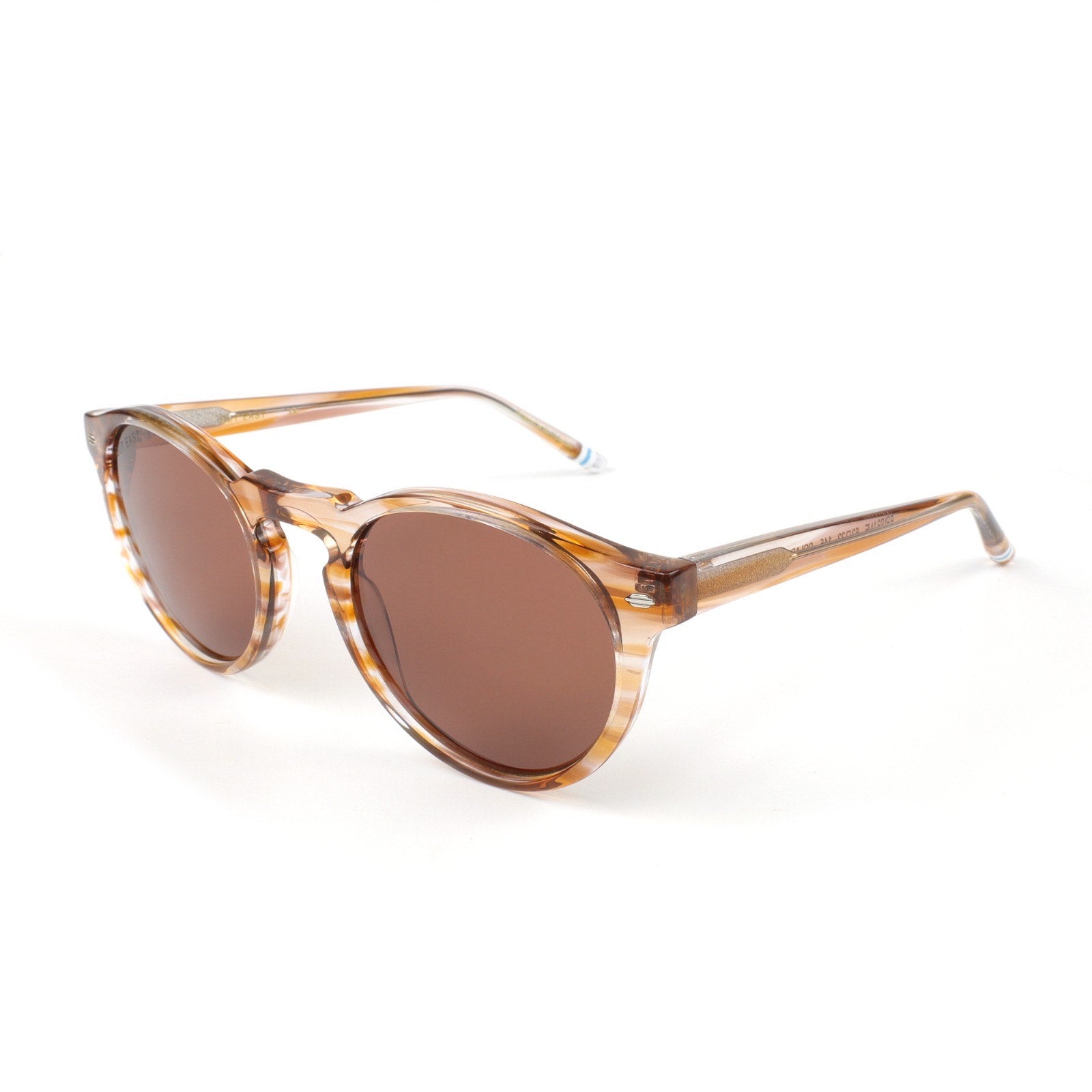 Sunglasses with tortoiseshell frame and brown lenses on a white background