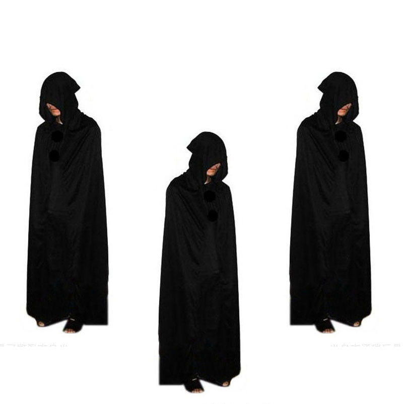 Three black hooded cloaks worn by a person on a white background