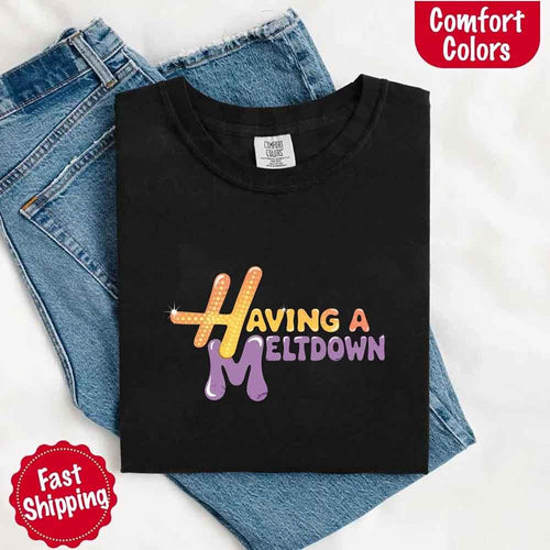 Black t-shirt with colorful text design on a white background