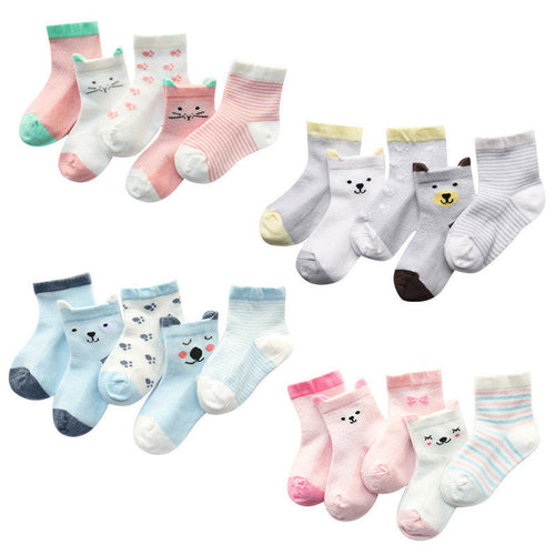 Set of baby socks with animal designs on a white background
