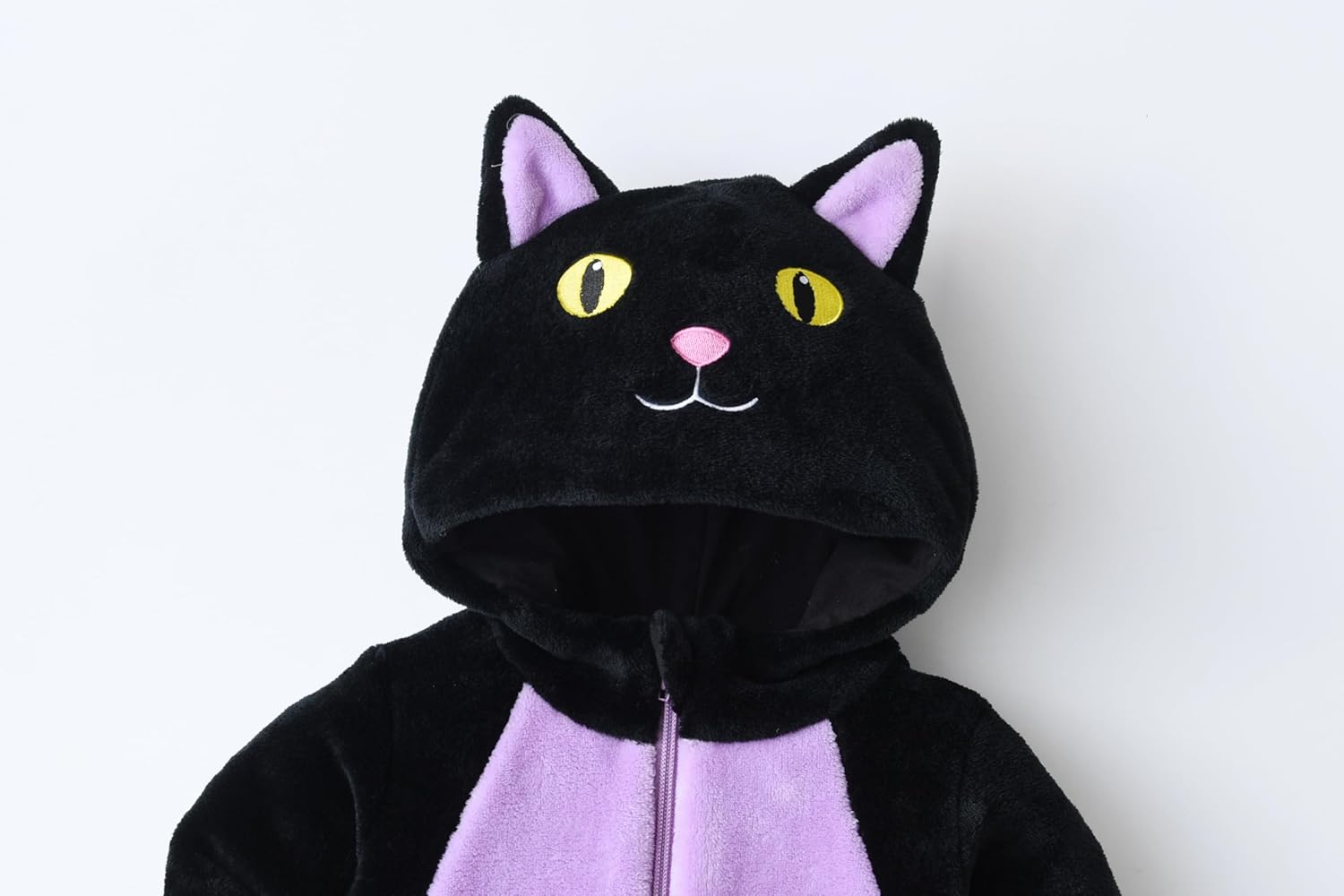 Black cat-themed hoodie with yellow eyes and pink inner ears on a white background