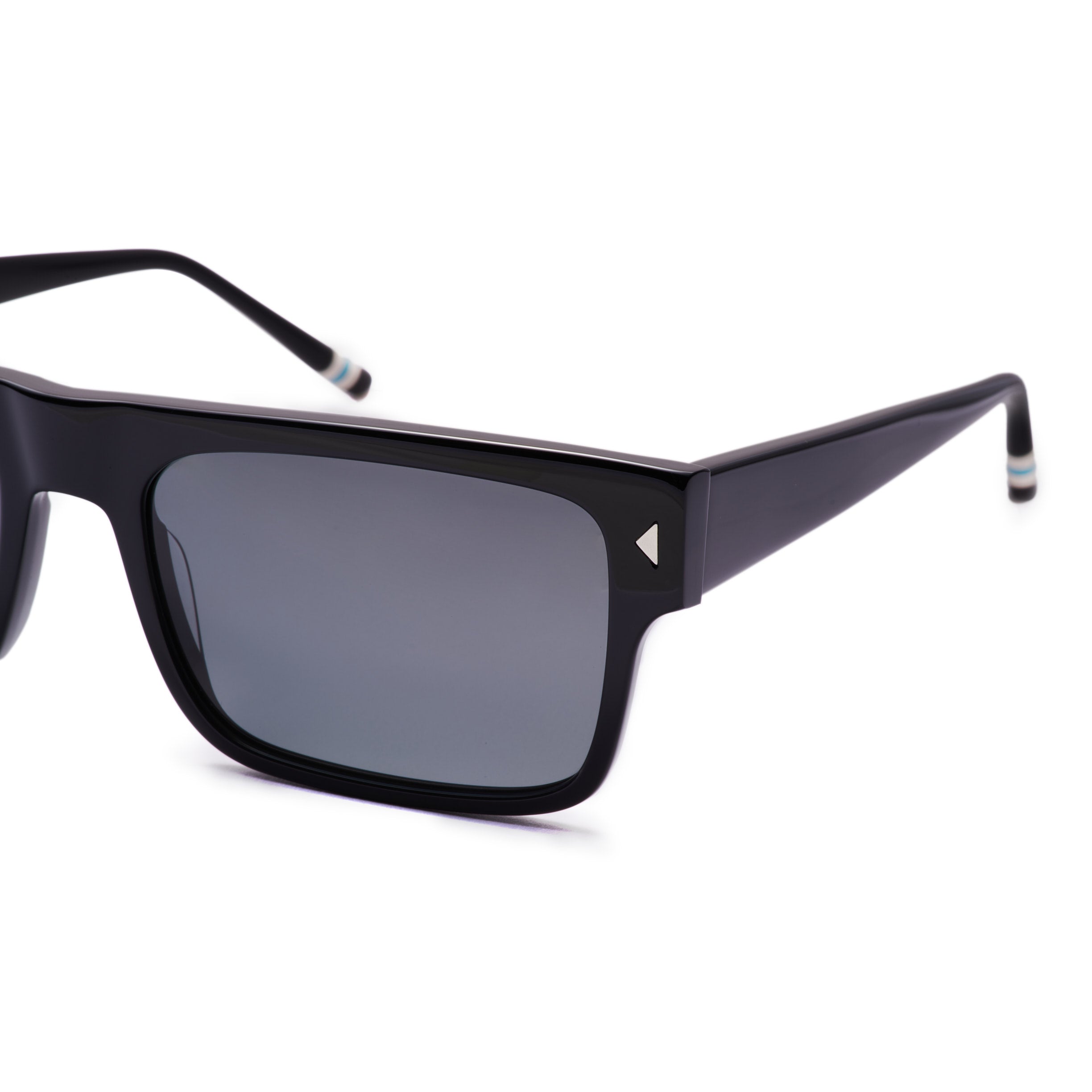 Black sunglasses with dark lenses on a white background