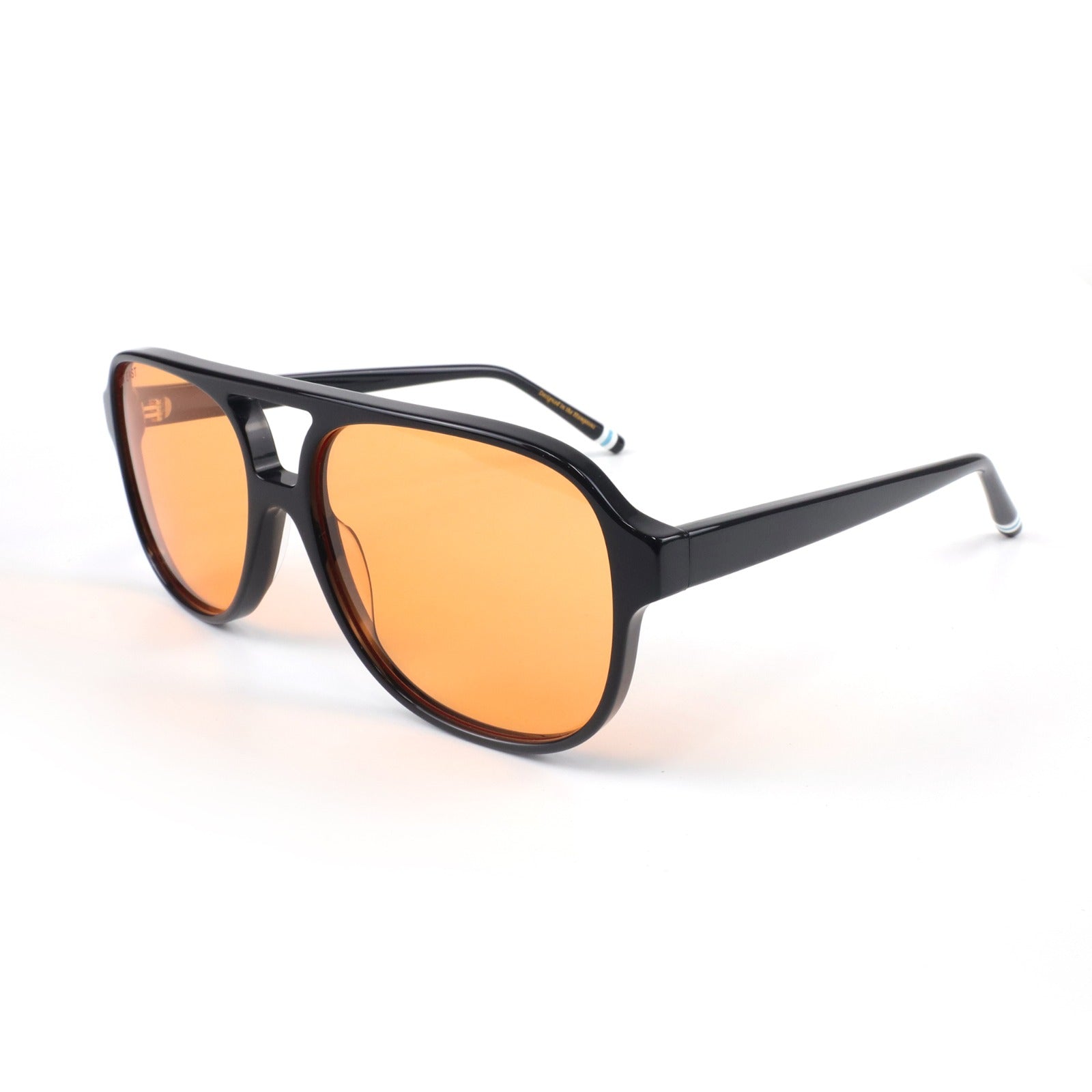 Sunglasses with orange lenses and black frame on a white background