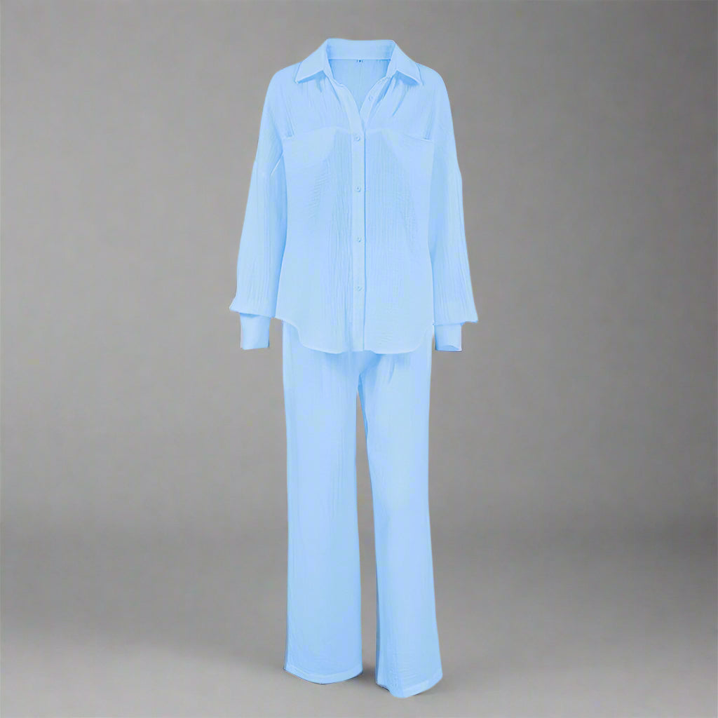 Light blue pajama set on a gray background