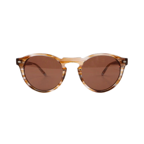 Sunglasses with tortoiseshell frame and brown lenses on a white background