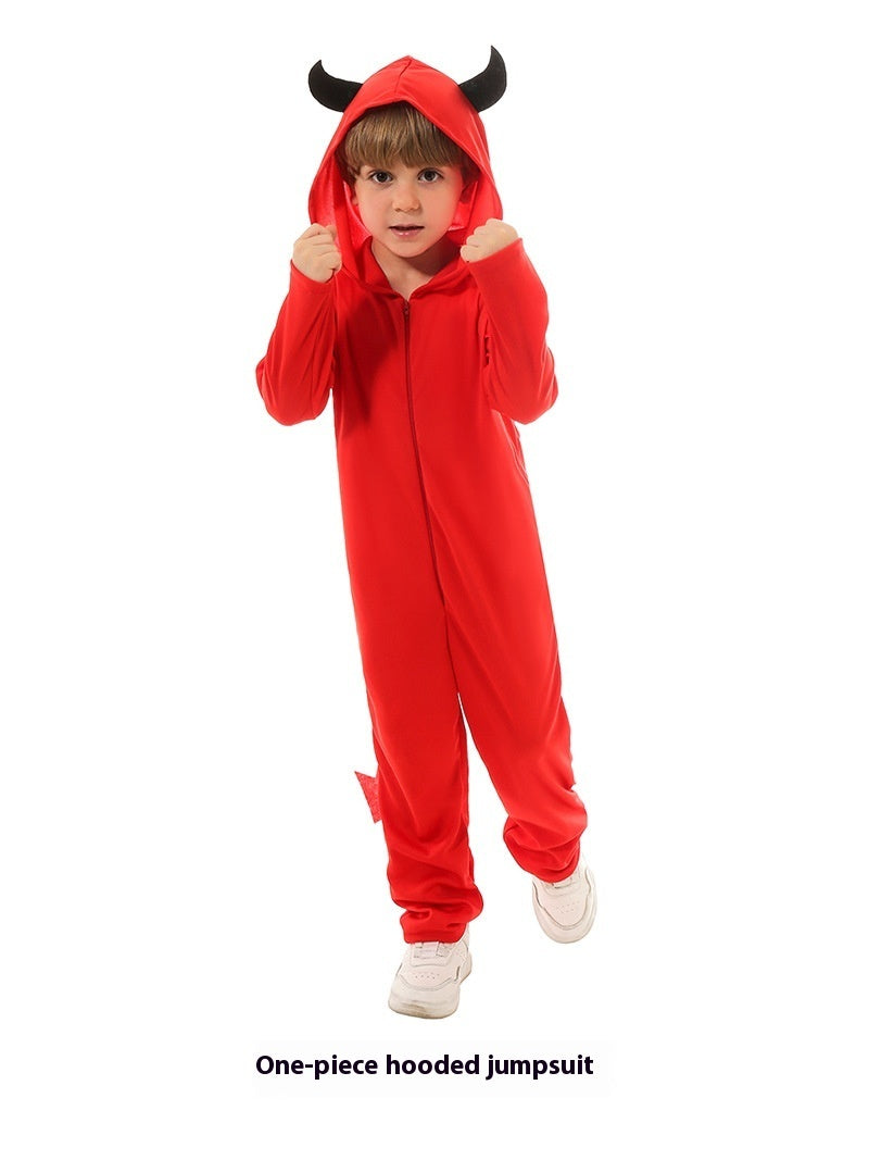 Child wearing a red one-piece hooded jumpsuit with black horns on a white background