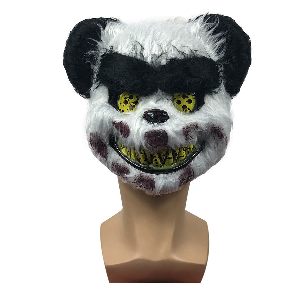 Panda mask with black ears, yellow eyes, and a wide grin on a mannequin head against a white background.