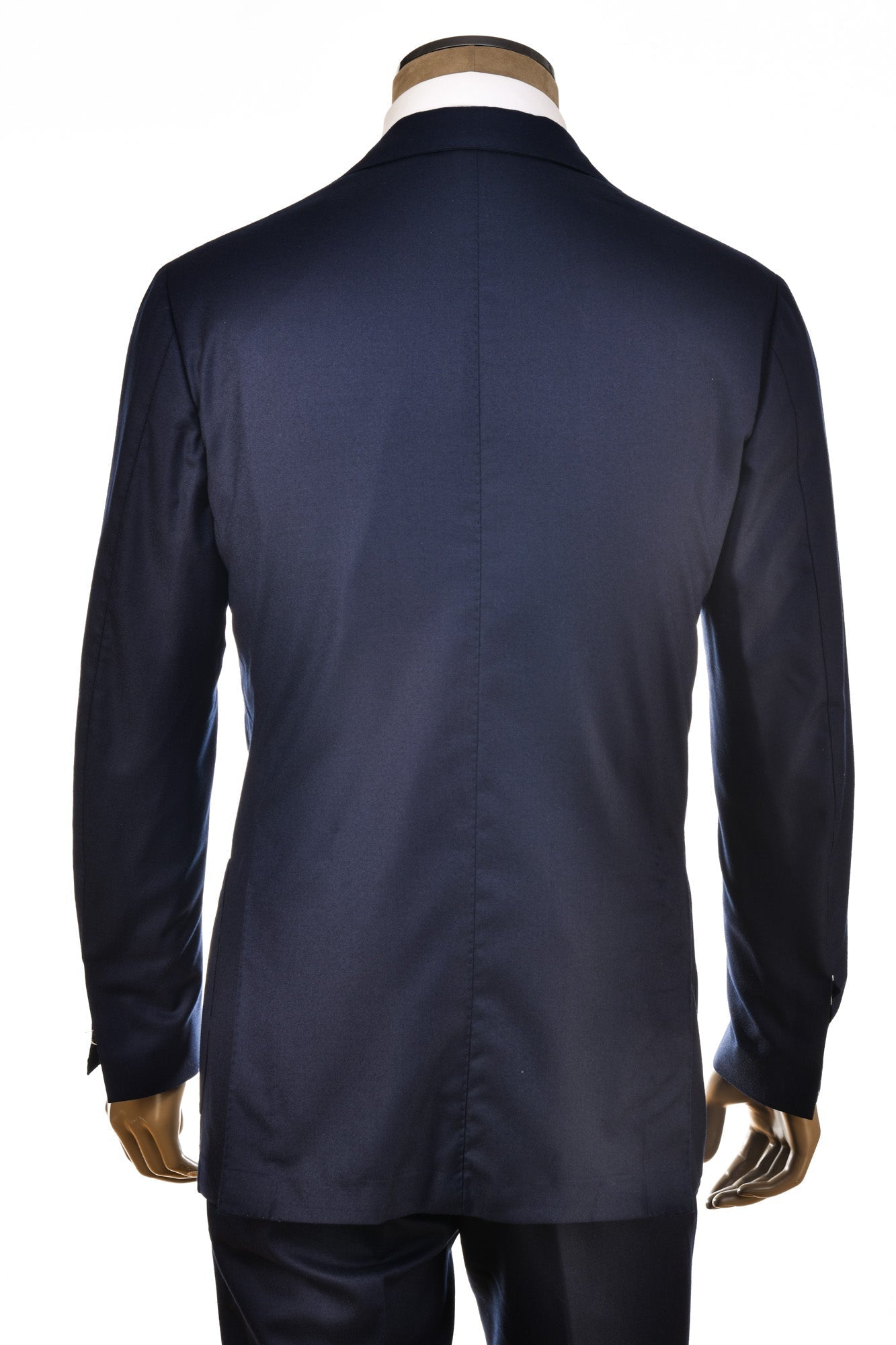 Navy blue suit jacket on a mannequin with a white background