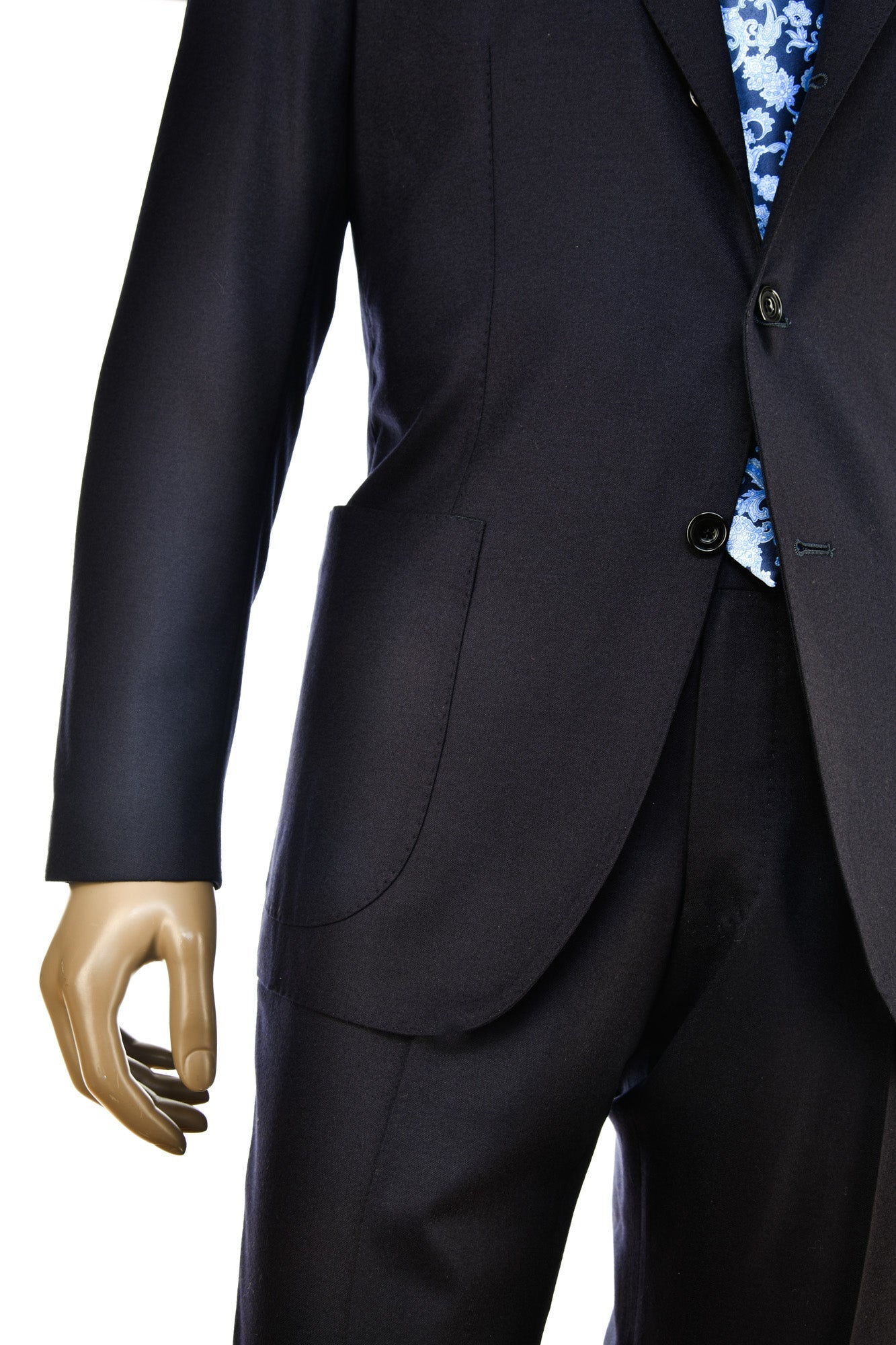 Black suit jacket and pants on a mannequin with a white background
