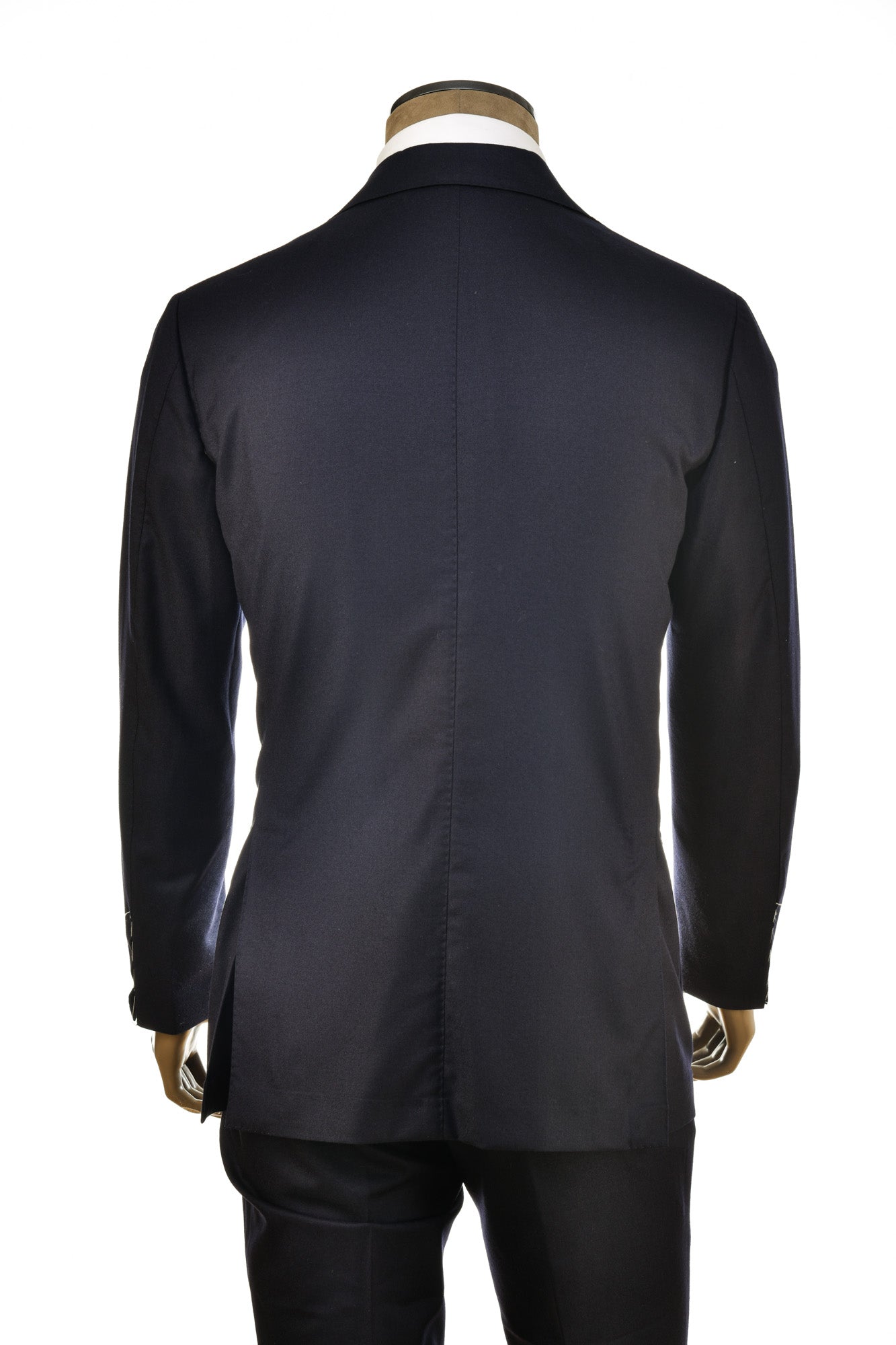 Black coat on a mannequin against a white background