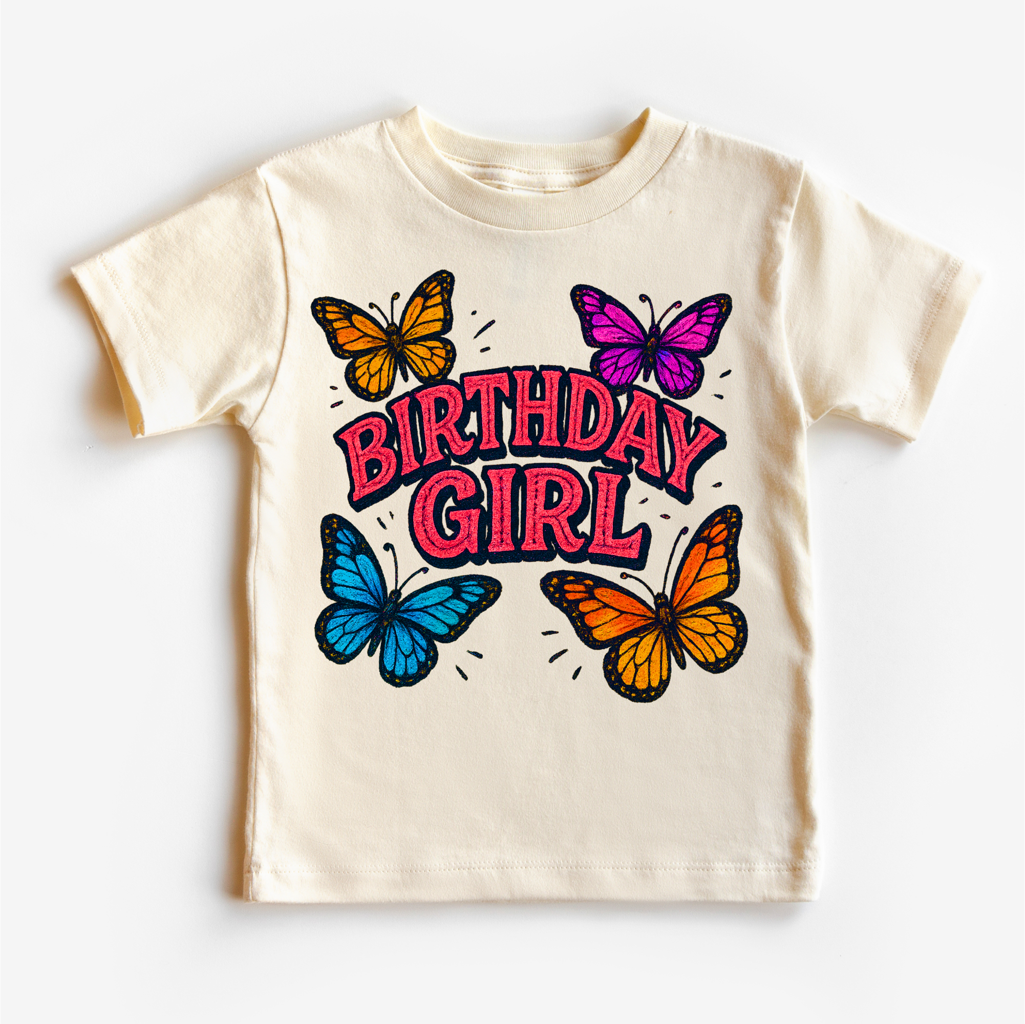 Beige t-shirt with 'Birthday Girl' text and colorful butterflies on a white background