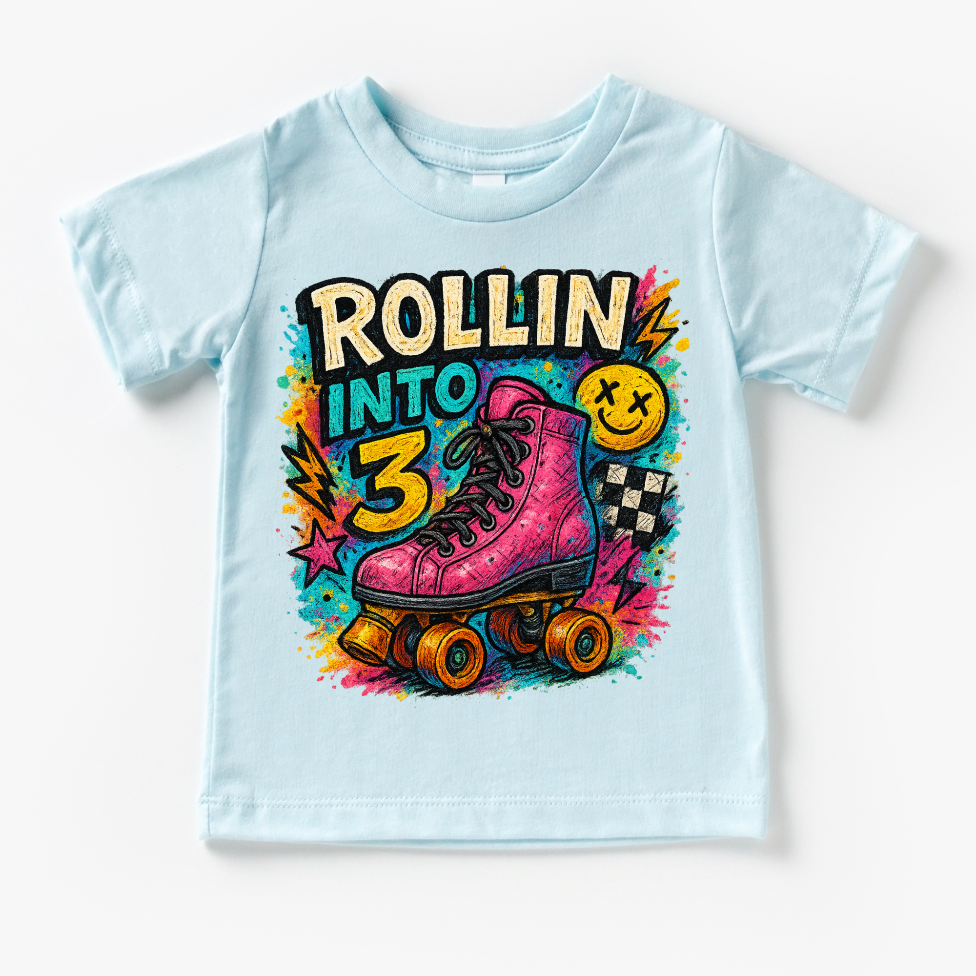 Light blue t-shirt with a colorful design of a pink roller skate and text 'Rollin into 3' on a white background