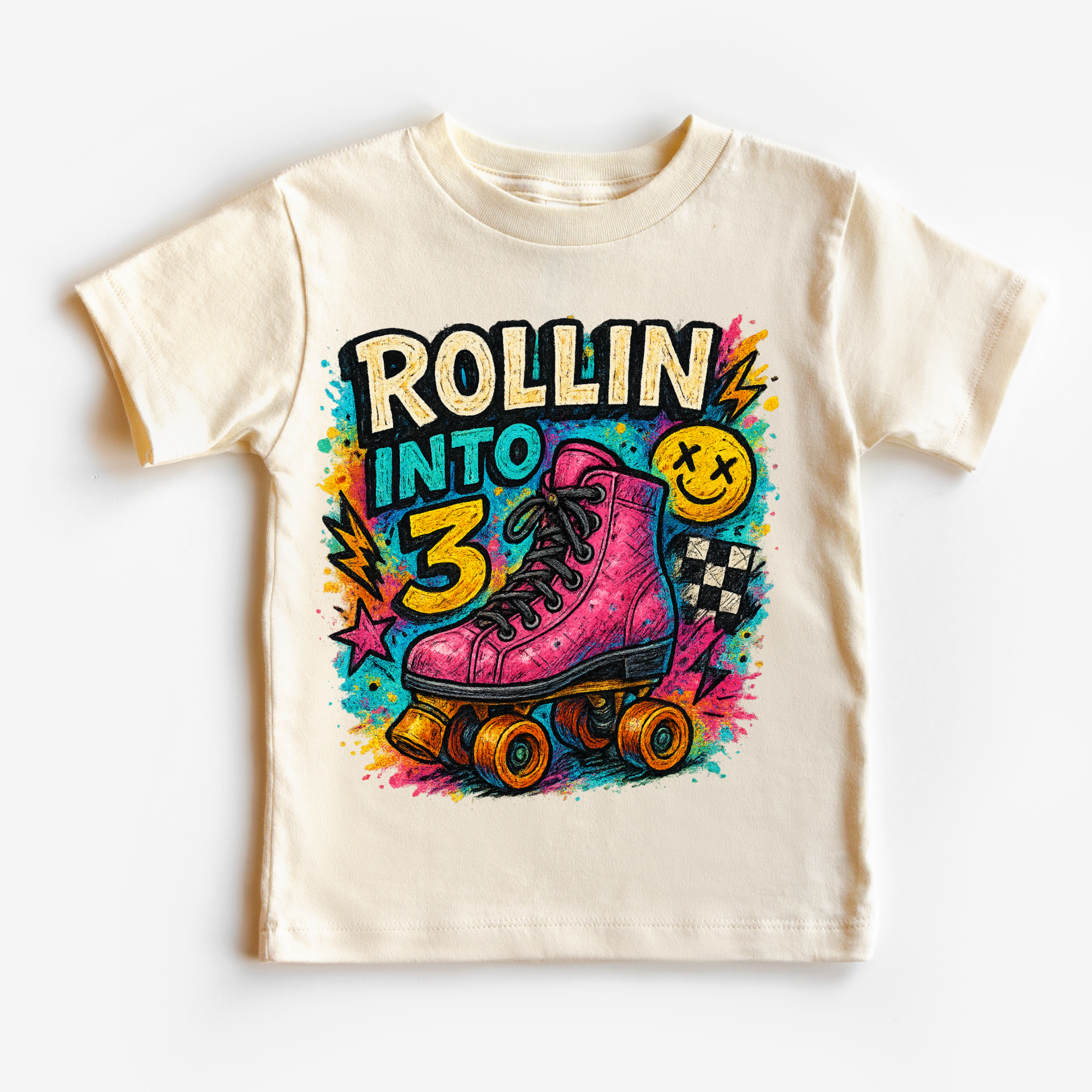 Children's t-shirt with a pink roller skate and 'Rollin into 3' text on a white background