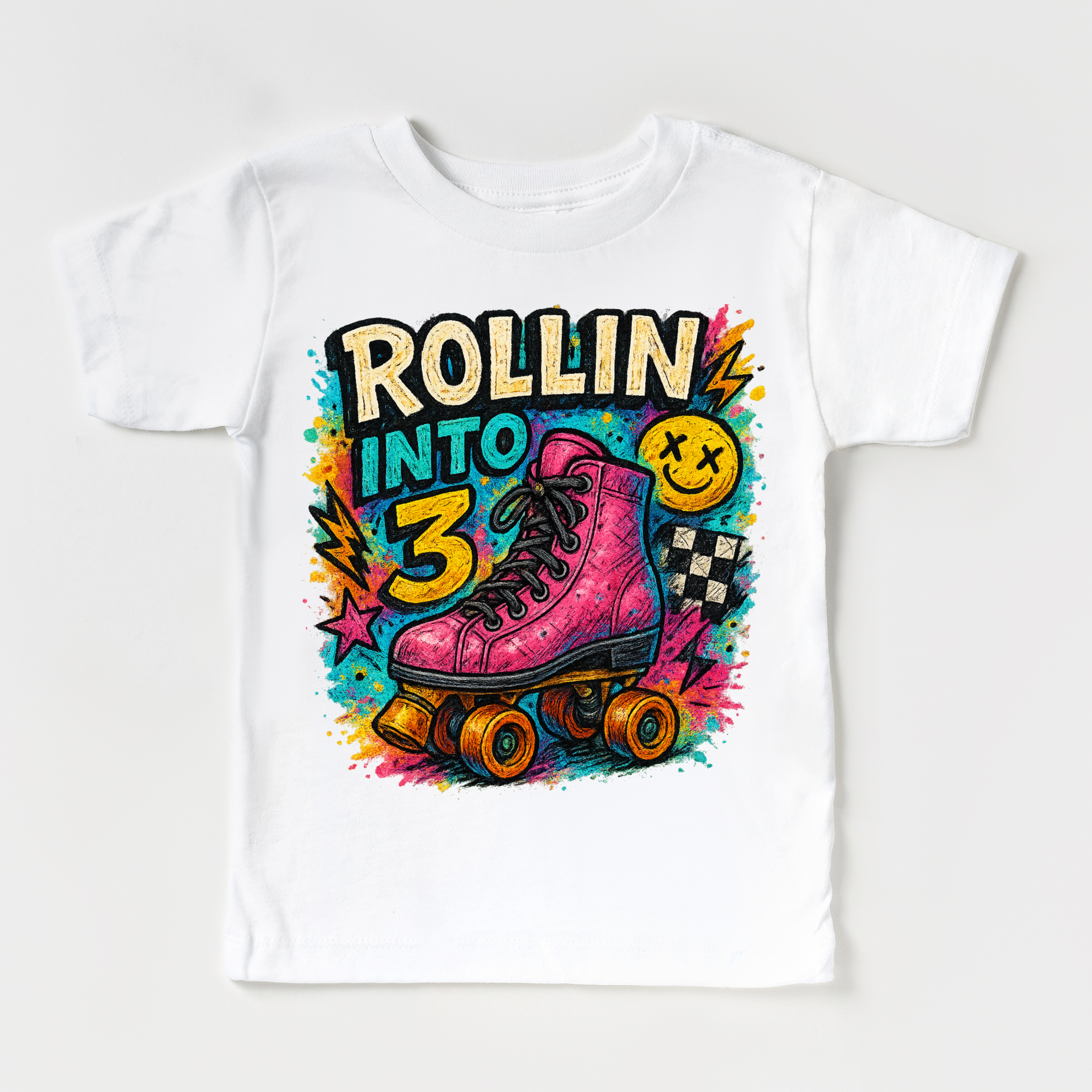 White t-shirt with a colorful design of a pink roller skate and 'Rollin into 3' text on a white background