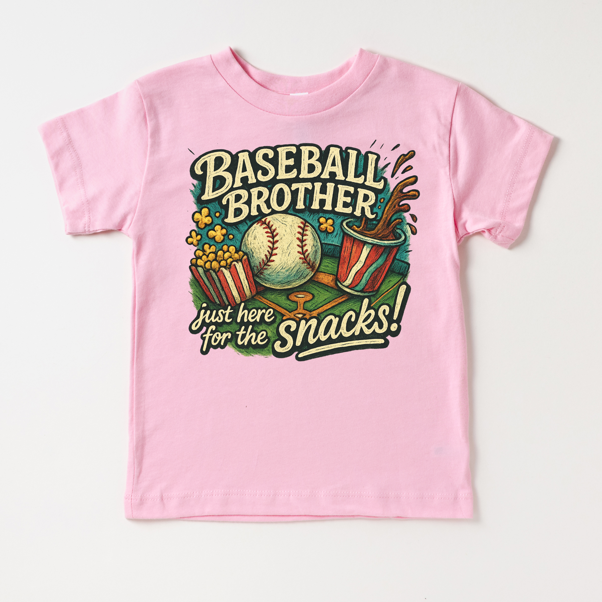 Pink t-shirt with baseball-themed graphic and text on a white background