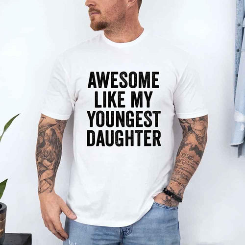Man wearing a white t-shirt with 'Awesome like my youngest daughter' text.