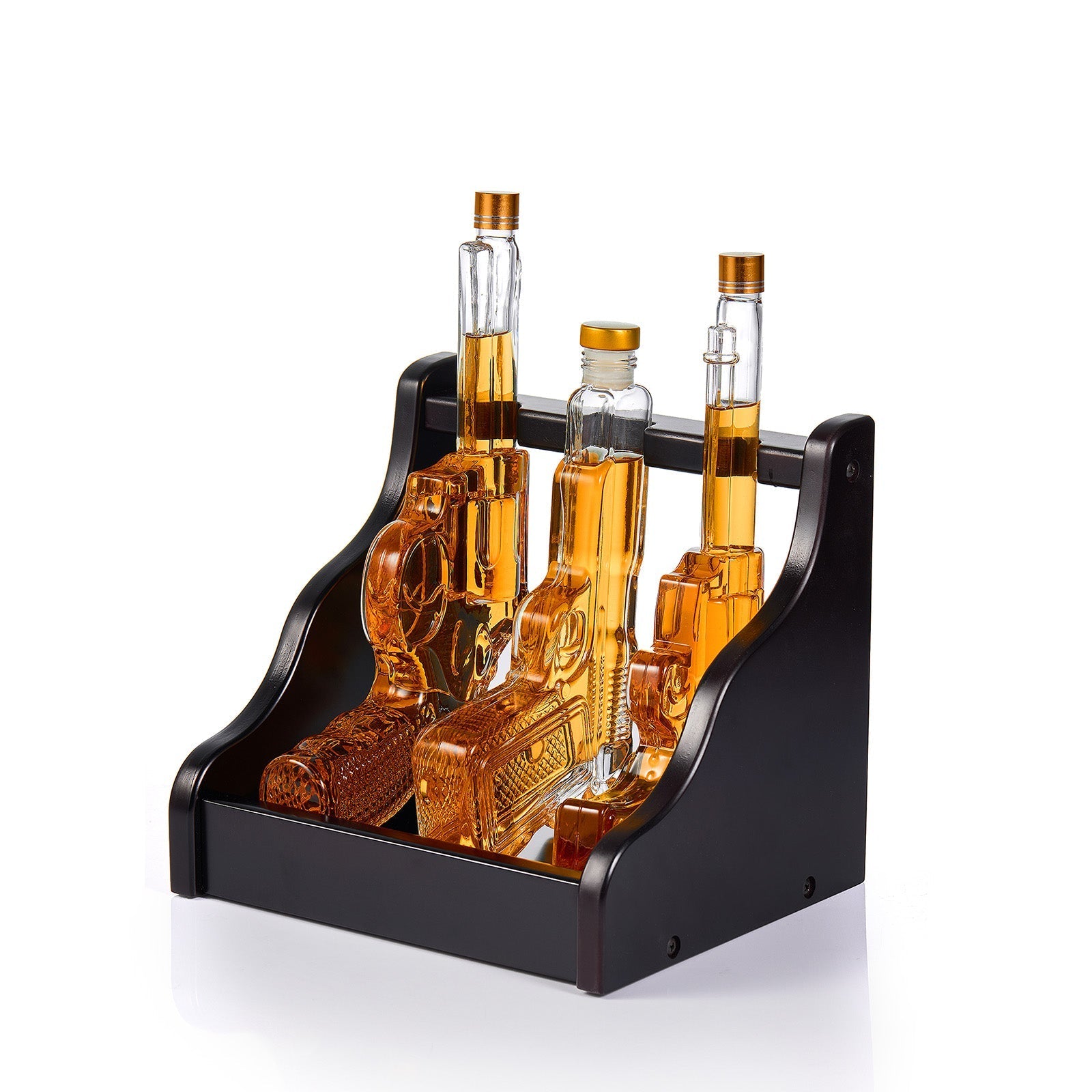 Set of glass bottles with a black holder on a white background