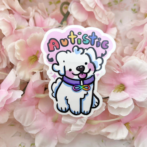 Sticker of a cartoon dog with 'Autistic' text on pink flowers
