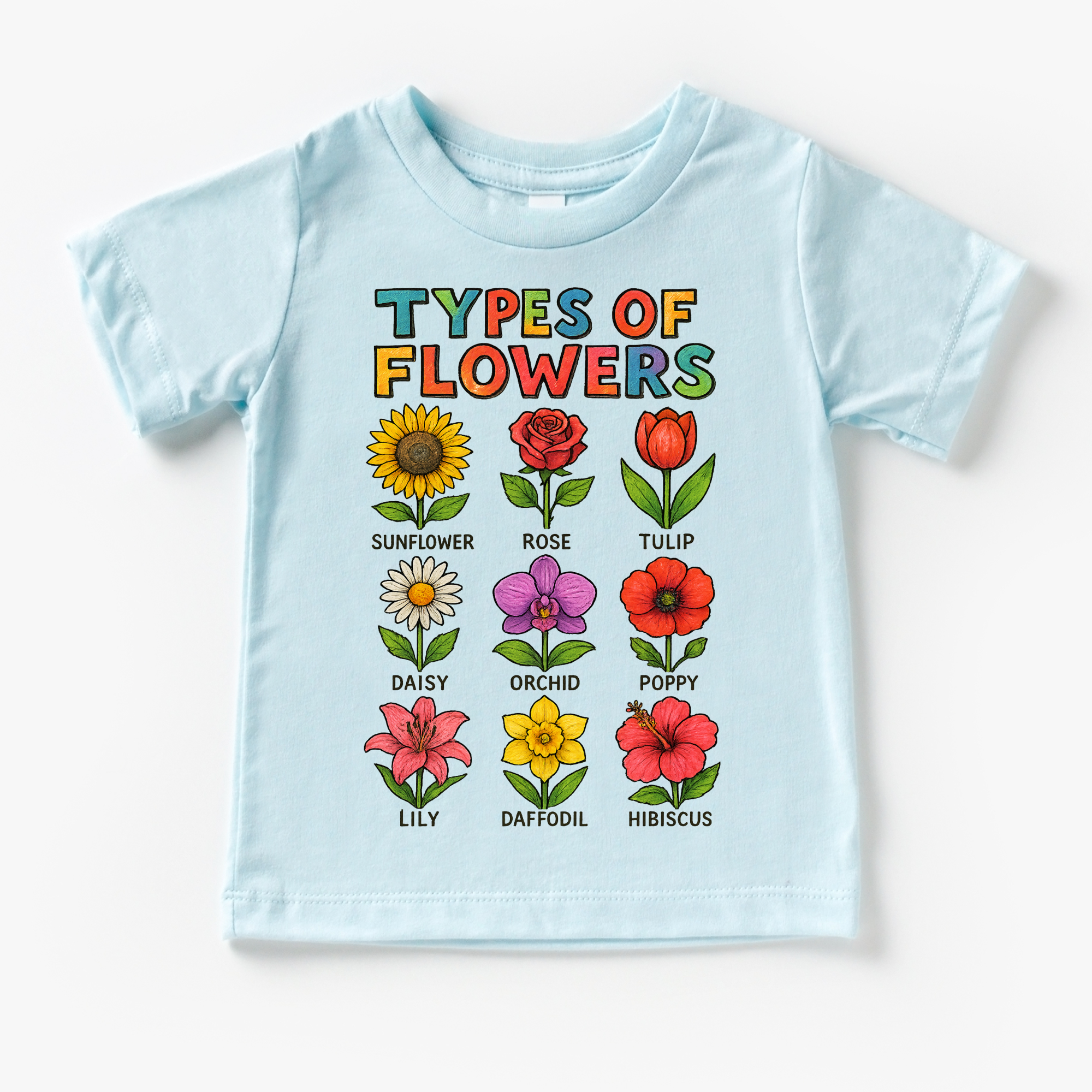 Light blue t-shirt with colorful flower illustrations and text on a white background