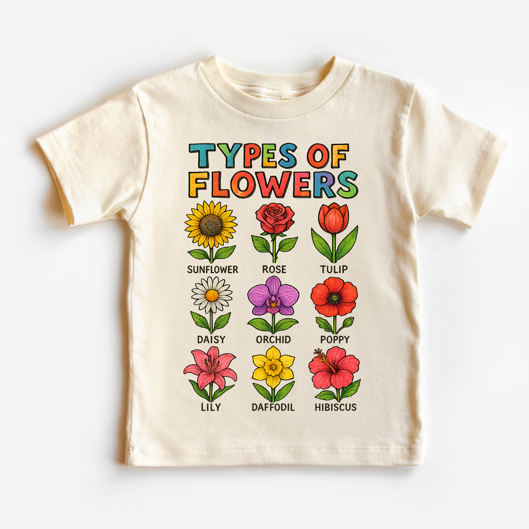 Beige t-shirt with colorful illustrations of flowers and their names on a white background