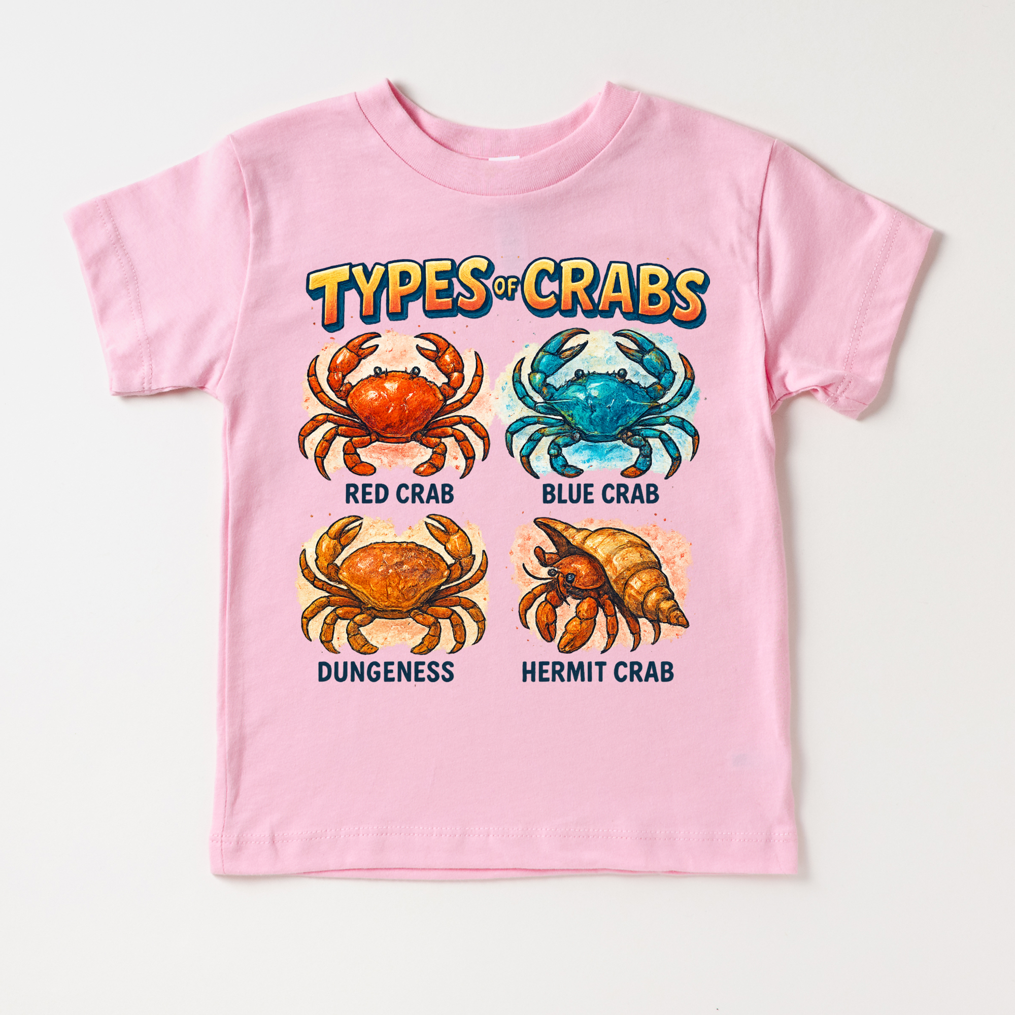 Pink t-shirt with illustrations of crabs and text on a white background