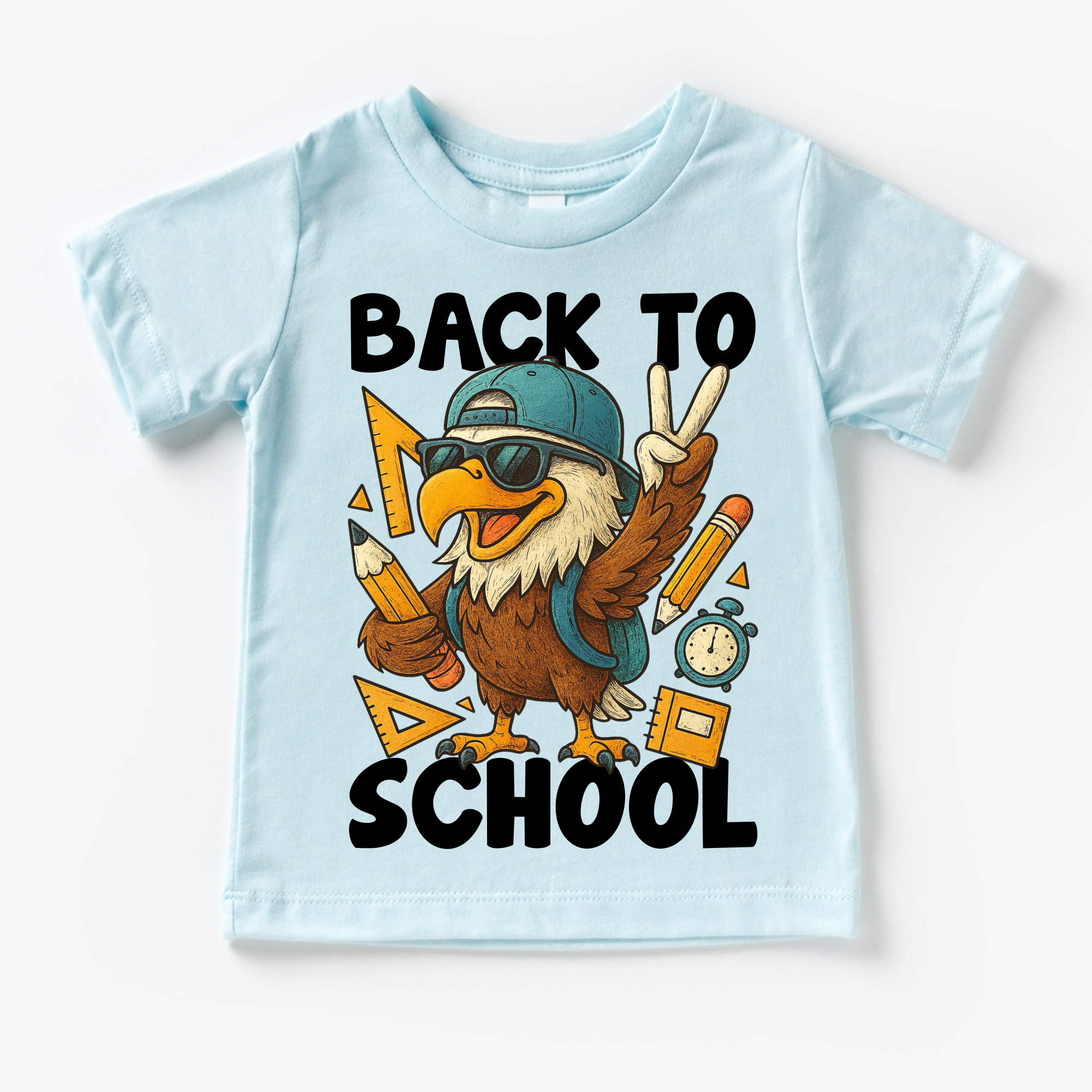 Light blue t-shirt with an eagle graphic and 'Back to School' text on a white background